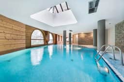 Ski In Ski Out Apartment with Pool & Mountain View - Image 2