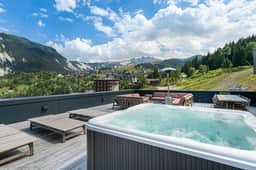 Elegant Ski Escape With Outdoor Jacuzzi - Image 2