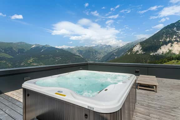 Elegant Ski Escape With Outdoor Jacuzzi - Image 1
