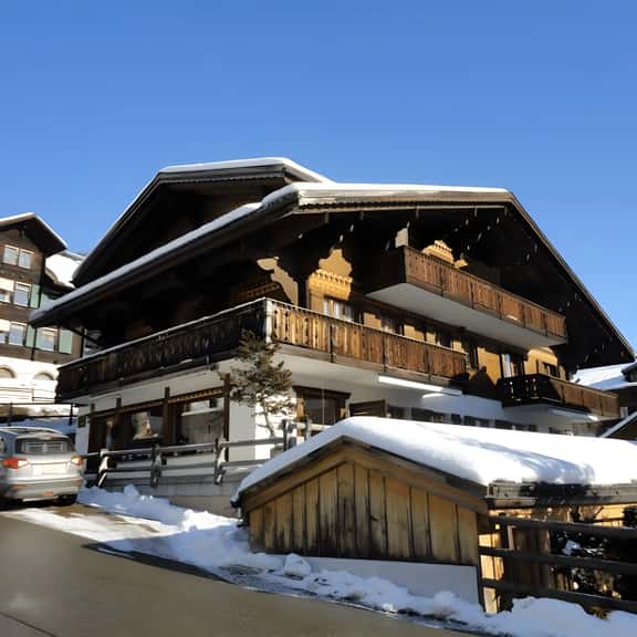 Top Floor Chalet with Balcony and Parking in Saanen - Image 1