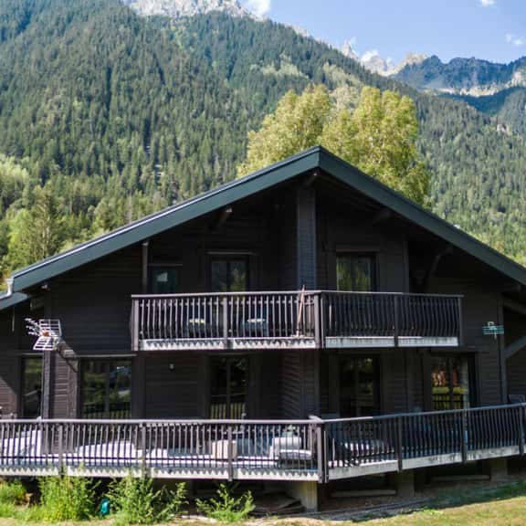 Modern Chalet Overlooking Alpine Mountain Peaks - Image 1