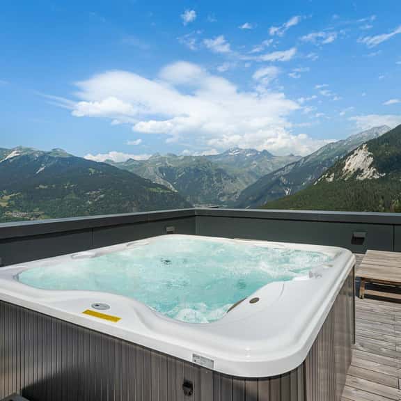Elegant Ski Escape With Outdoor Jacuzzi - Image 1